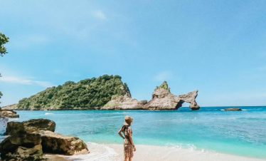 Atuh Beach Nusa Penida with white sand beach and unique rock formations.