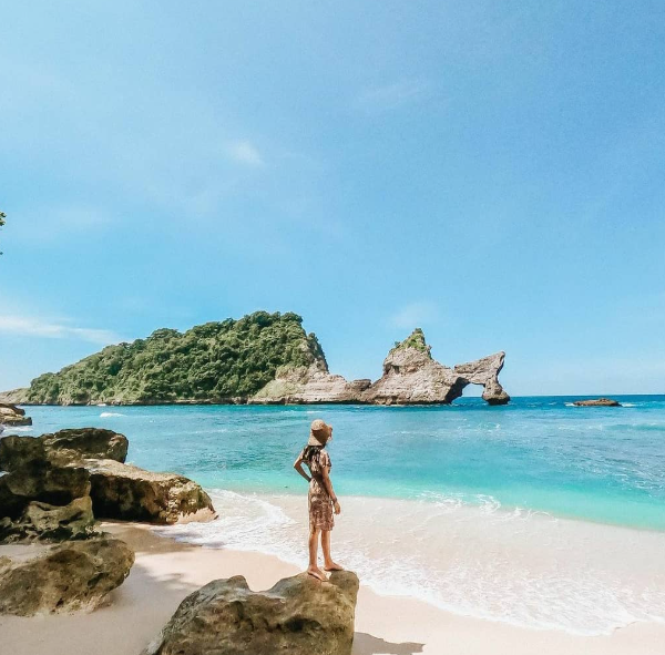 Atuh Beach Nusa Penida with white sand beach and unique rock formations.