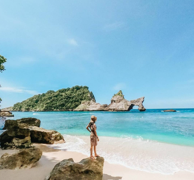 Atuh Beach Nusa Penida with white sand beach and unique rock formations.